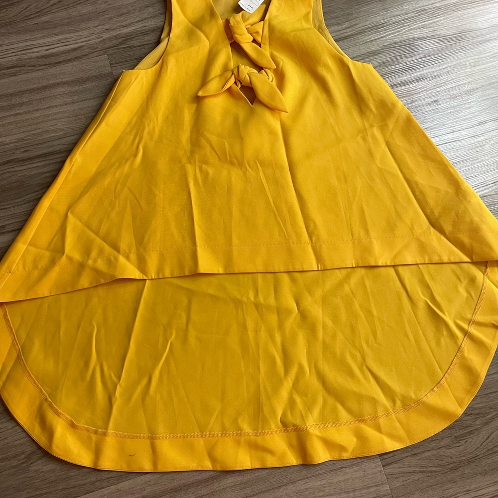 Endless rose high low sleeveless top yellow for women. Brand new, size medium.